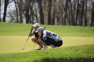 2025 Girls' Championship - Hannah Wang and Daphne Breen reading the green.
