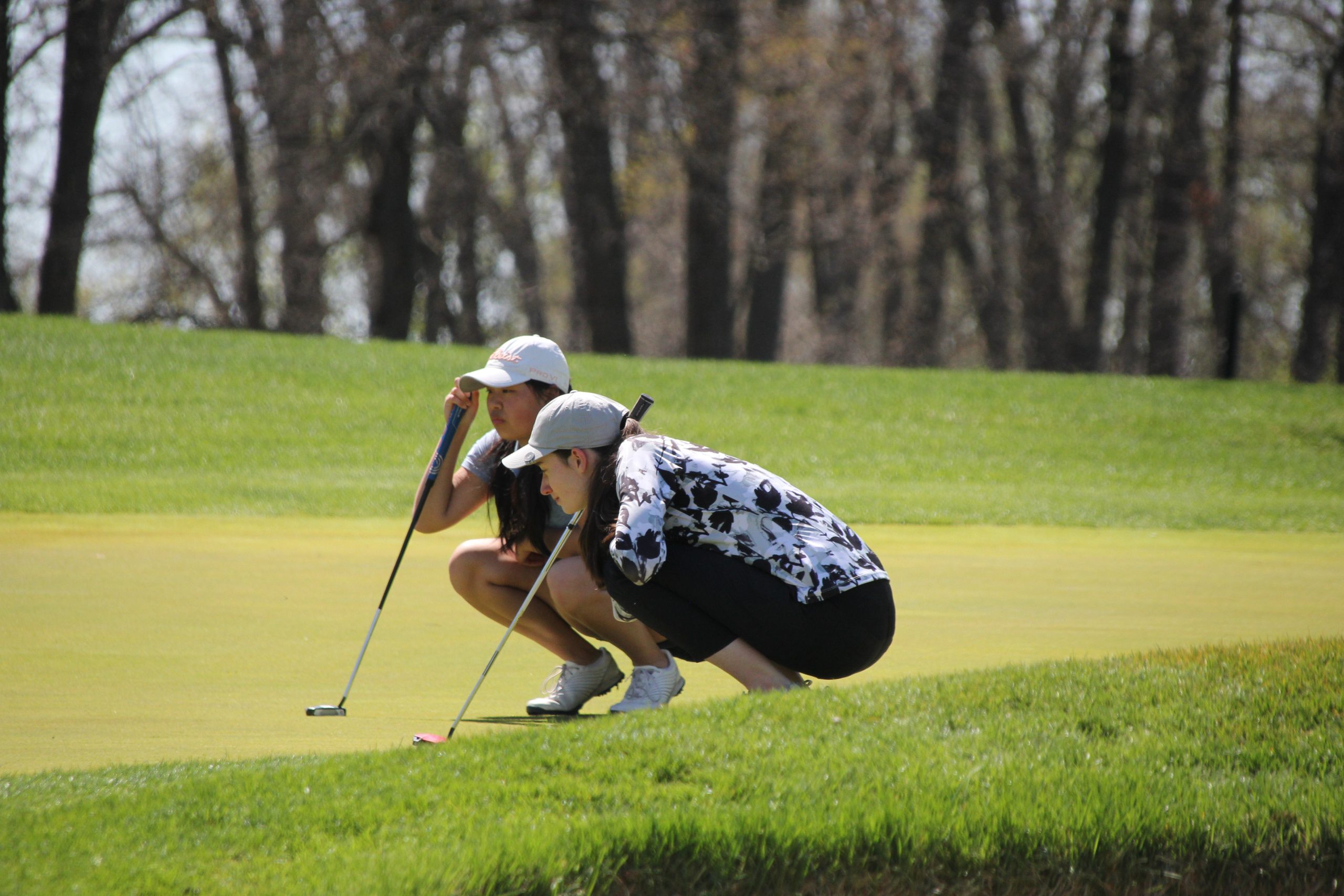 2025 Girls' Championship - Hannah Wang and Daphne Breen reading the green.