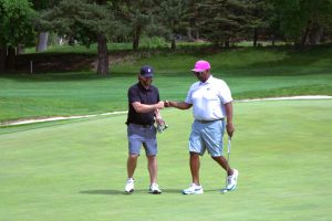 2025 Senior Mid-Am Team - Geoffrey Vincent and Glen McCoy celebrate.